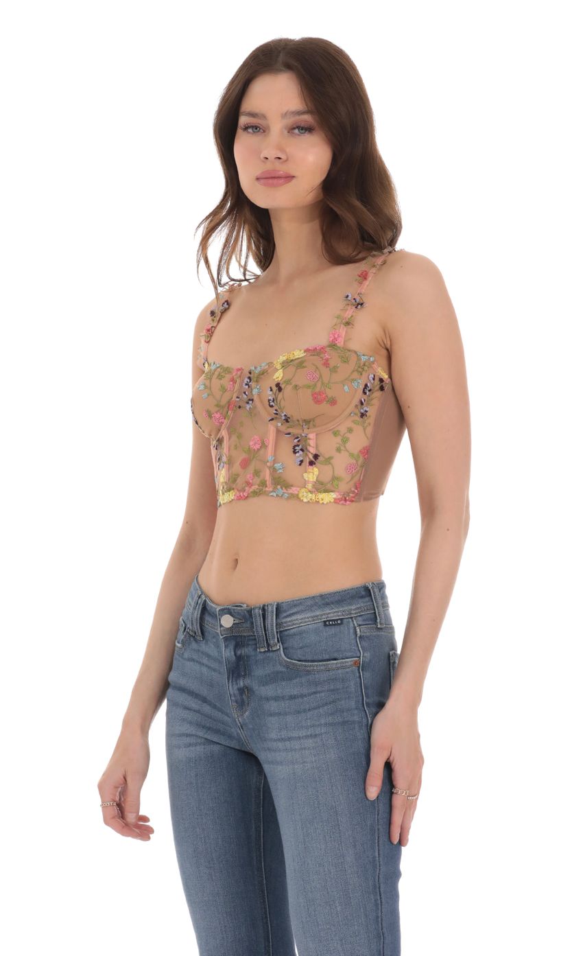 Picture Floral Embroidered Corset Top in Brown. Source: https://media-img.lucyinthesky.com/data/Jan24/850xAUTO/e438d390-7108-4e75-805b-346e682b9058.jpg