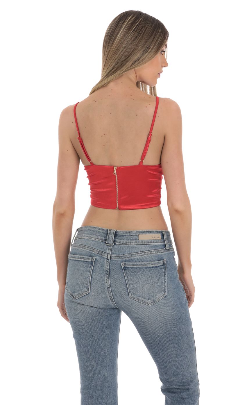 Picture Satin V-Neck Crop Top in Red. Source: https://media-img.lucyinthesky.com/data/Jan24/850xAUTO/ea38a2b3-b18f-4db7-aa62-9c7fa98c7672.jpg