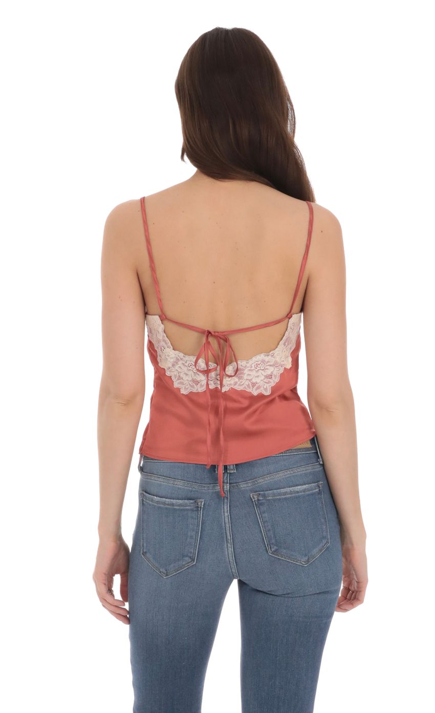 Picture Satin Lace V-Neck Top in Rust Coral. Source: https://media-img.lucyinthesky.com/data/Jan24/850xAUTO/ebab3ac8-52fc-4a19-88b2-7367baa242cf.jpg