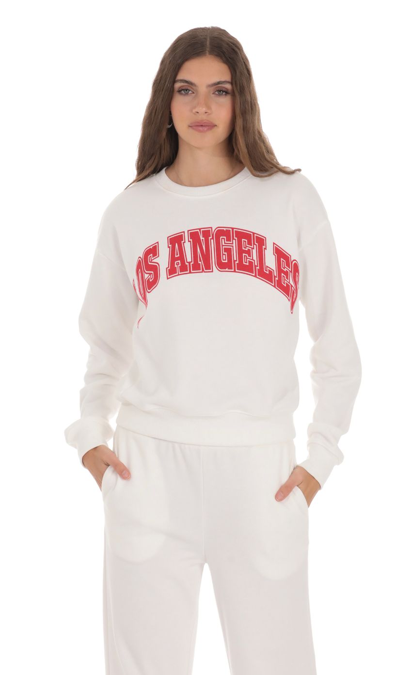 Picture Los Angeles Jumper in White. Source: https://media-img.lucyinthesky.com/data/Jan24/850xAUTO/ee07eb9b-d044-44c3-b188-83c799e7dd63.jpg