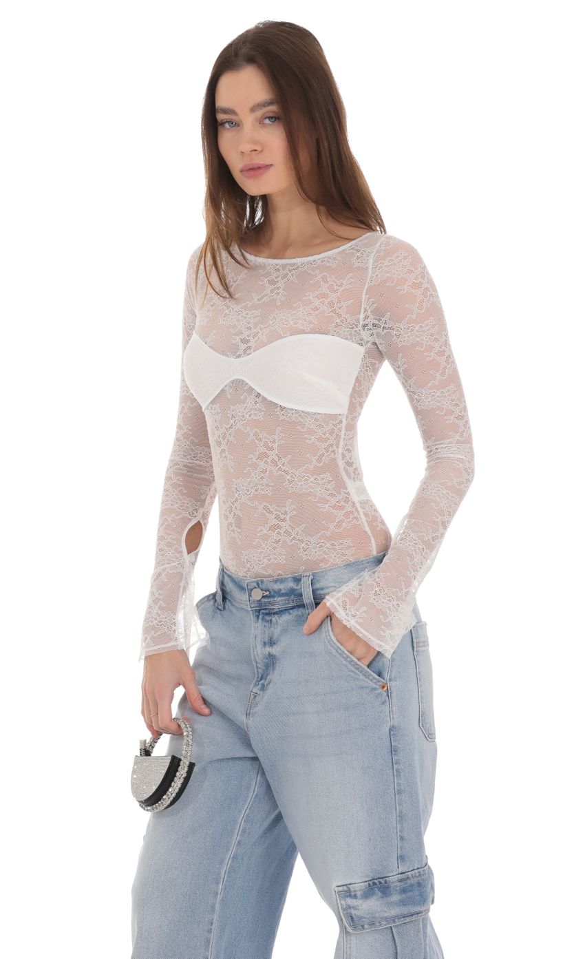 Picture Long Sleeve Lace Bodysuit in White. Source: https://media-img.lucyinthesky.com/data/Jan24/850xAUTO/ef0a27b9-a66a-4c96-b78c-cdbe4ddfd50b.jpg