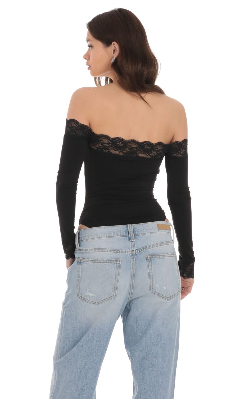 Picture Off Shoulder Lace Bodysuit in Black. Source: https://media-img.lucyinthesky.com/data/Jan24/850xAUTO/ef34cf6c-4d24-421d-b207-ea56b15367f0.jpg