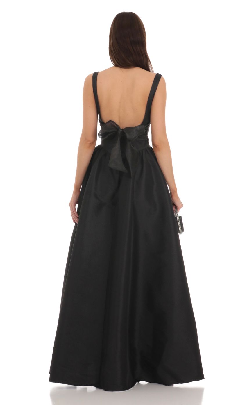 Picture Back Bow Gown in Black. Source: https://media-img.lucyinthesky.com/data/Jan24/850xAUTO/f70ee912-47f6-4d16-8f62-5ea2b58adcec.jpg