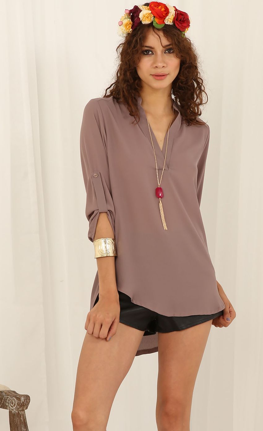 Picture 3/4 Sleeve V-Neck Top. Source: https://media-img.lucyinthesky.com/data/Jul15_1/850xAUTO/0Y5A3868.JPG