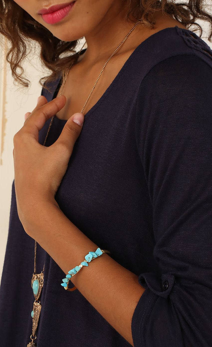Picture Turquoise Stone Bracelet. Source: https://media-img.lucyinthesky.com/data/Jul15_1/850xAUTO/0Y5A6606.JPG