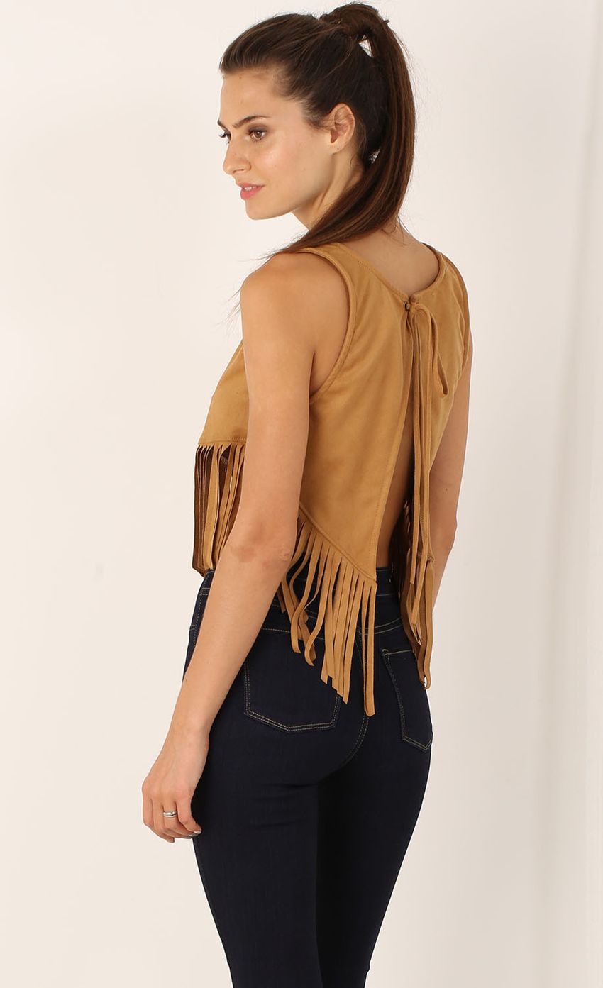 Picture Sleeveless Suede Fringe Top. Source: https://media-img.lucyinthesky.com/data/Jul15_2/850xAUTO/0Y5A0052.JPG