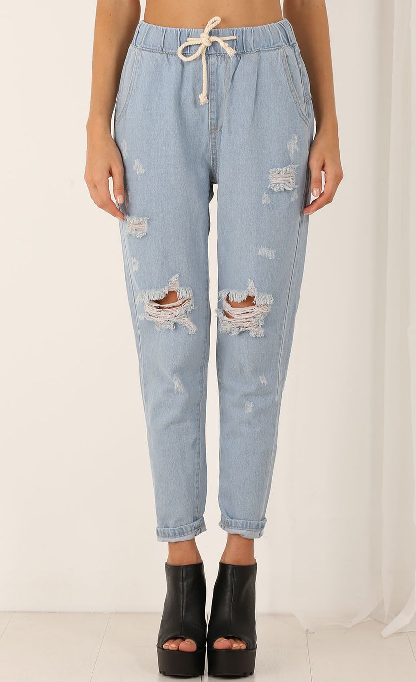 Picture Scuffed Knee Drawstring Jeans. Source: https://media-img.lucyinthesky.com/data/Jul15_2/850xAUTO/0Y5A3968.JPG