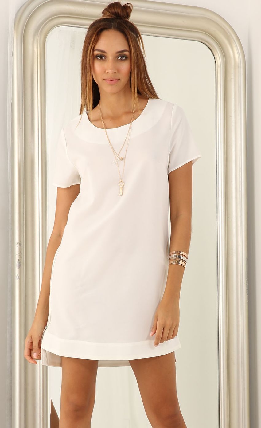 Picture Zipped Shift Dress In White. Source: https://media-img.lucyinthesky.com/data/Jul15_2/850xAUTO/0Y5A6341.JPG