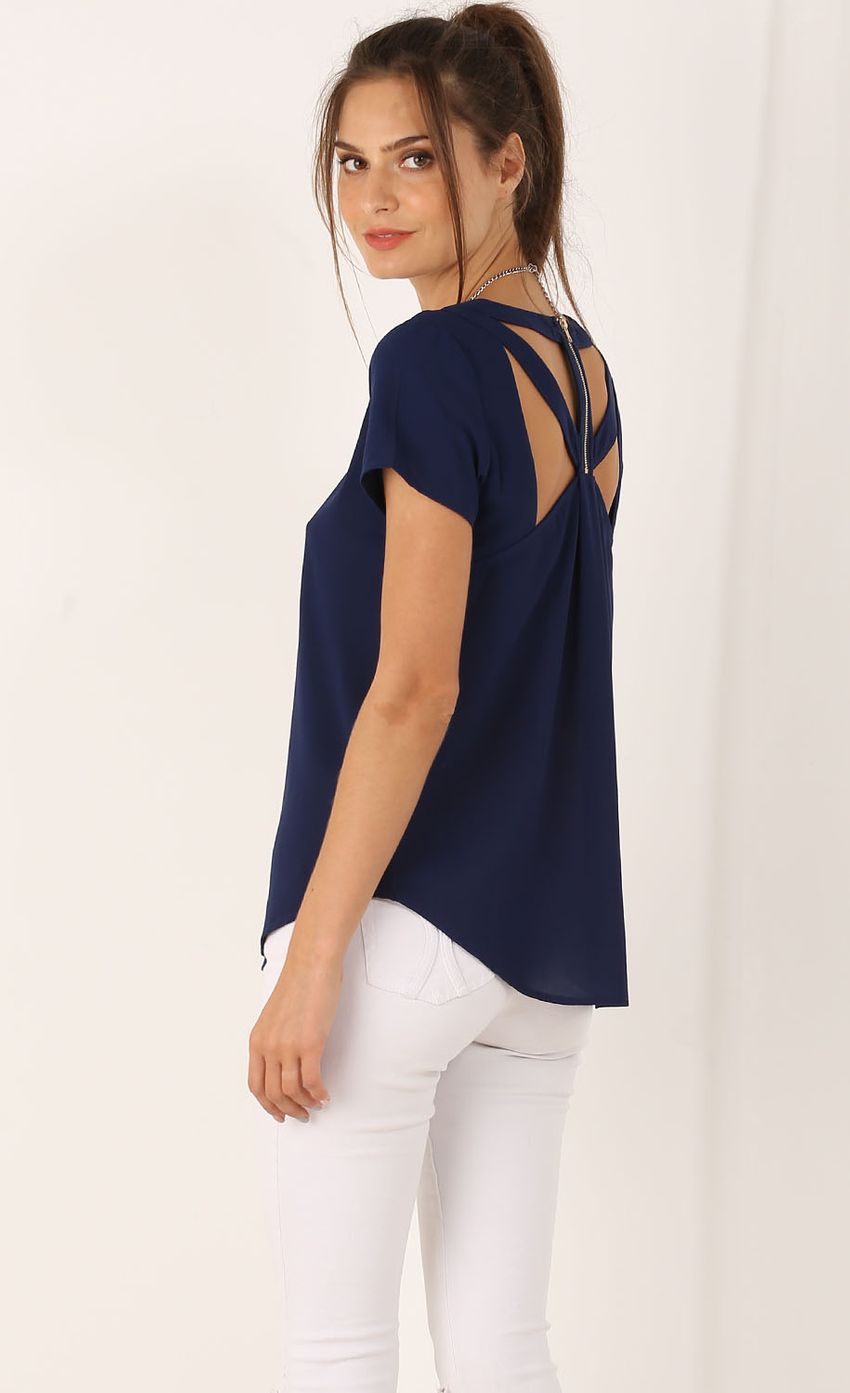 Picture Geometric Cutout Top In Blue. Source: https://media-img.lucyinthesky.com/data/Jul15_2/850xAUTO/0Y5A6714.JPG