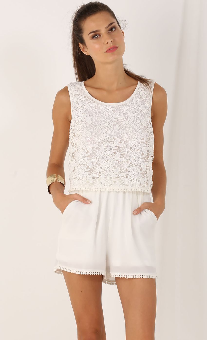 Picture Sleeveless Trimmed Lace Playsuit In White. Source: https://media-img.lucyinthesky.com/data/Jul15_2/850xAUTO/0Y5A8491.JPG