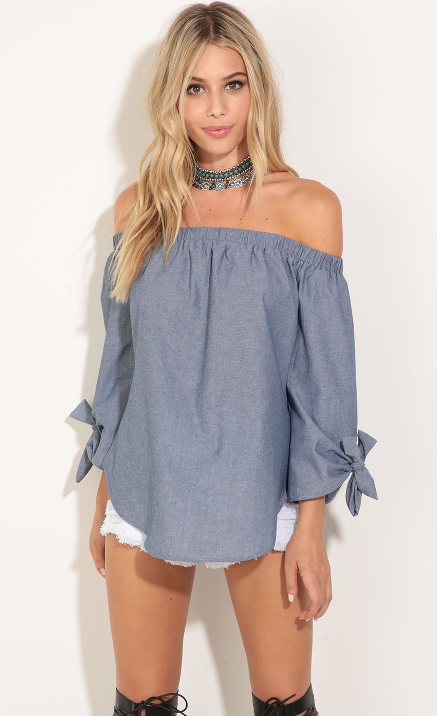 Picture Off The Shoulder Top in Dark Denim. Source: https://media-img.lucyinthesky.com/data/Jul16_1/850xAUTO/0Y5A3820.JPG