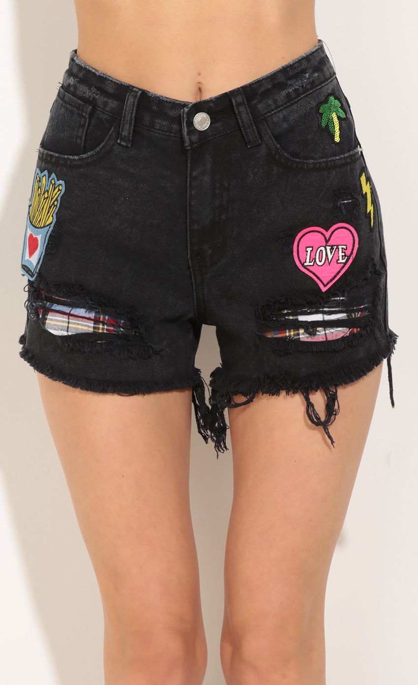 Picture Distressed Patchwork Denim Shorts In Black. Source: https://media-img.lucyinthesky.com/data/Jul16_2/850xAUTO/0Y5A6190.JPG