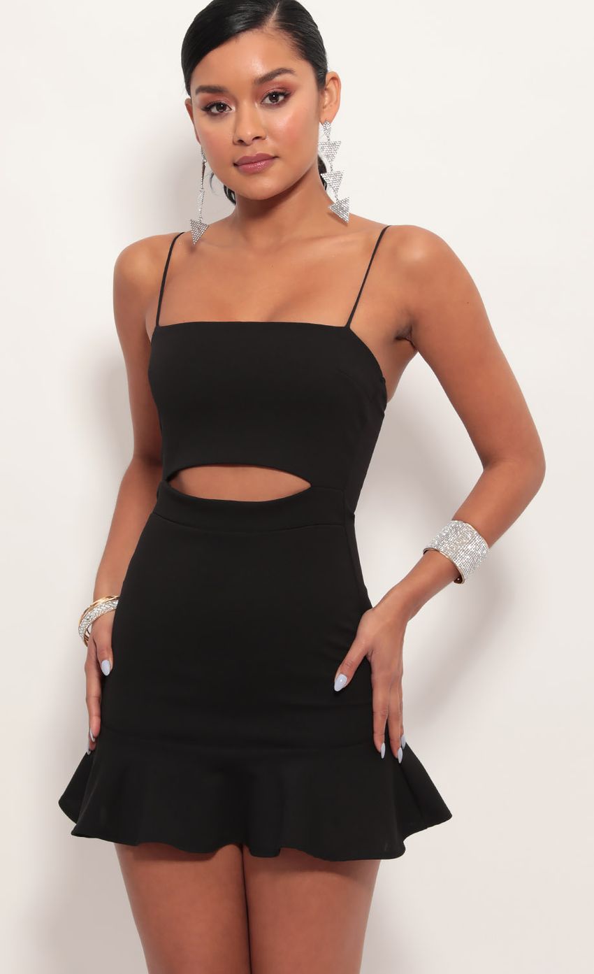 Picture Reilly Cutout Ruffle Dress in Black. Source: https://media-img.lucyinthesky.com/data/Jul19_1/850xAUTO/781A8312.JPG
