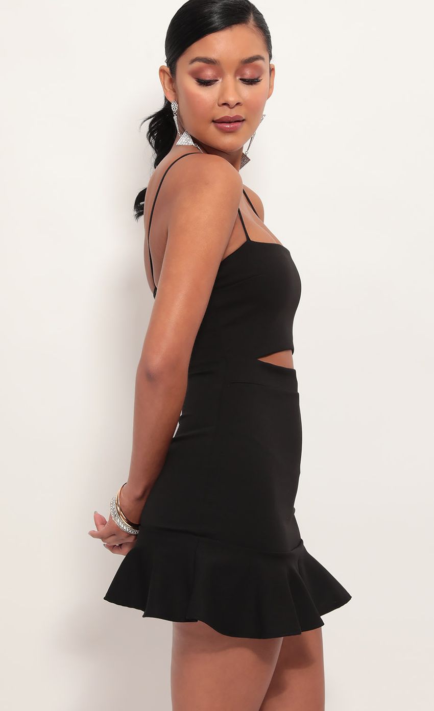Picture Reilly Cutout Ruffle Dress in Black. Source: https://media-img.lucyinthesky.com/data/Jul19_1/850xAUTO/781A8330.JPG