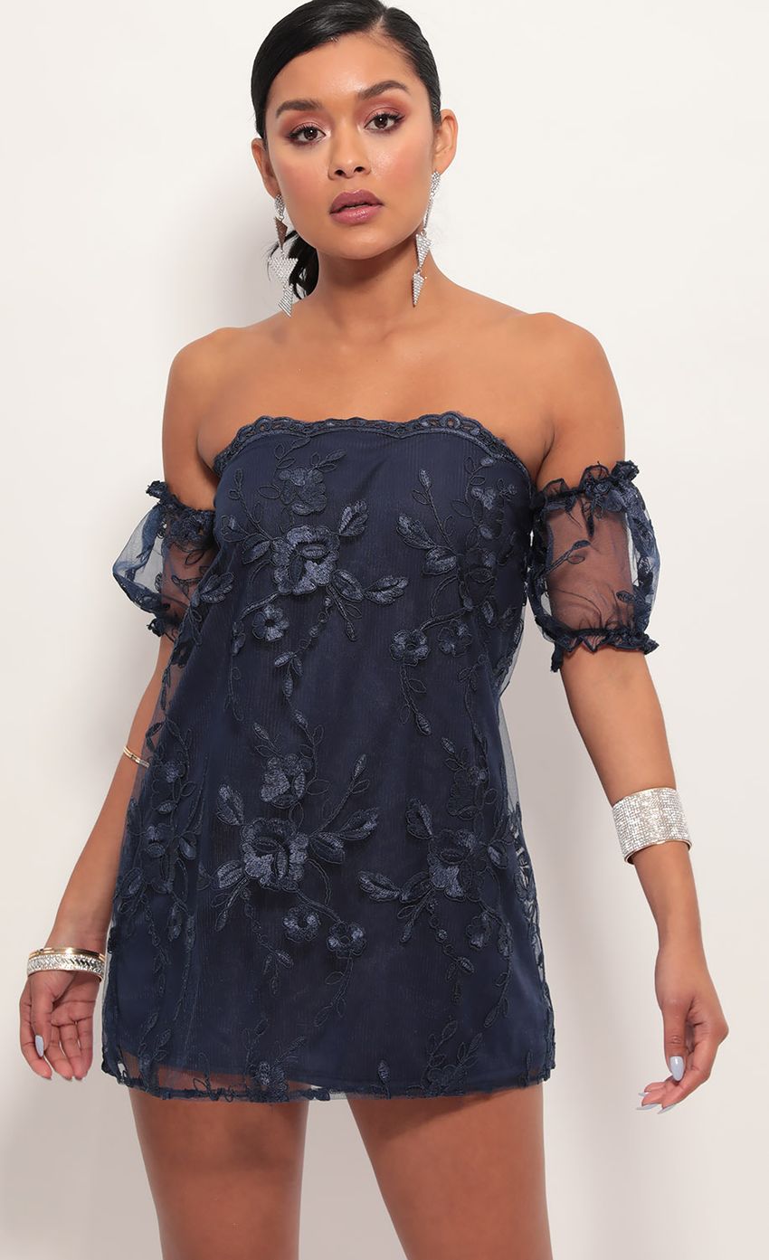 Picture Kayla Floral A-line Dress in Navy. Source: https://media-img.lucyinthesky.com/data/Jul19_1/850xAUTO/781A8538.JPG