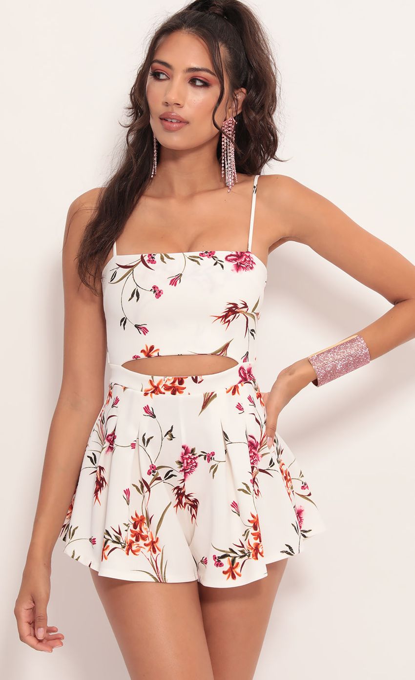 Picture Cutout Romper in White Floral. Source: https://media-img.lucyinthesky.com/data/Jul19_2/850xAUTO/781A0874.JPG