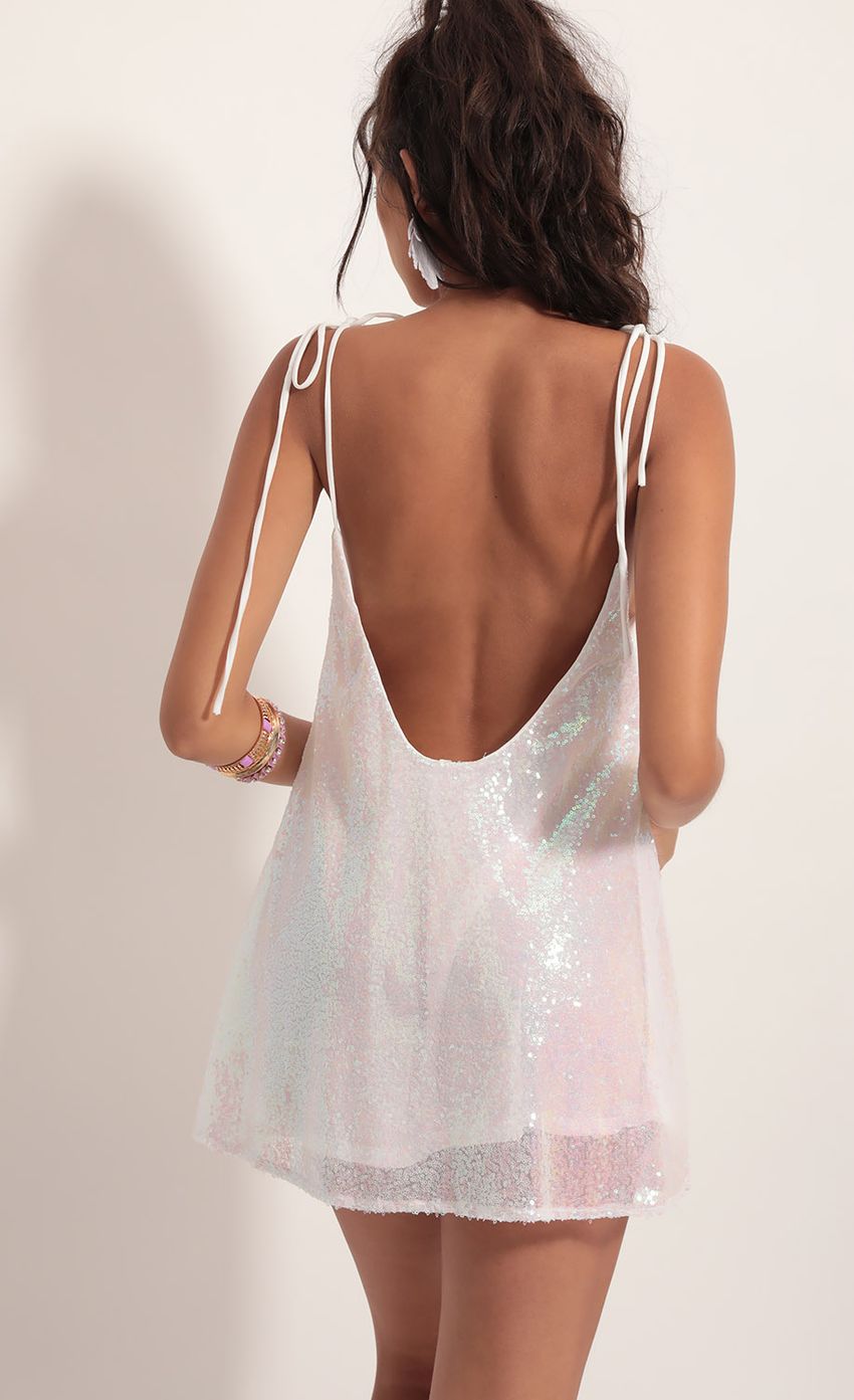 Picture Tie Dress In White Iridescence. Source: https://media-img.lucyinthesky.com/data/Jul19_2/850xAUTO/781A2822.JPG