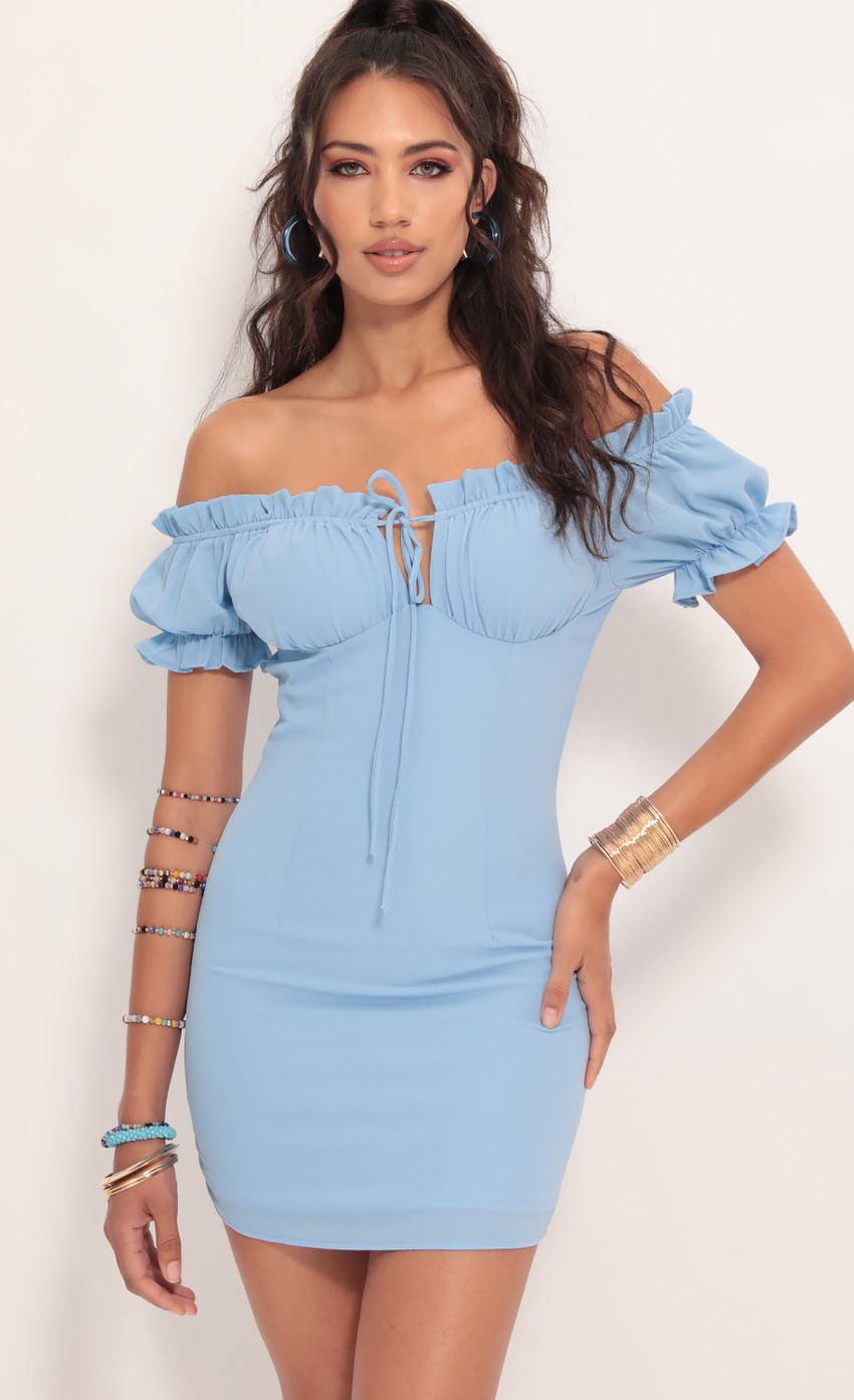 Picture Mallory Puff Sleeve Dress in Blue. Source: https://media-img.lucyinthesky.com/data/Jul19_2/850xAUTO/781A9095.JPG
