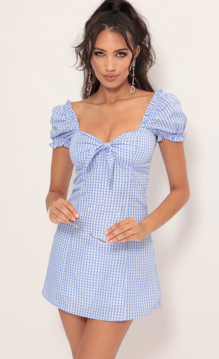 Picture Justina Puff Sleeve Dress in Blue Gingham. Source: https://media-img.lucyinthesky.com/data/Jul19_2/850xAUTO/781A9403.JPG