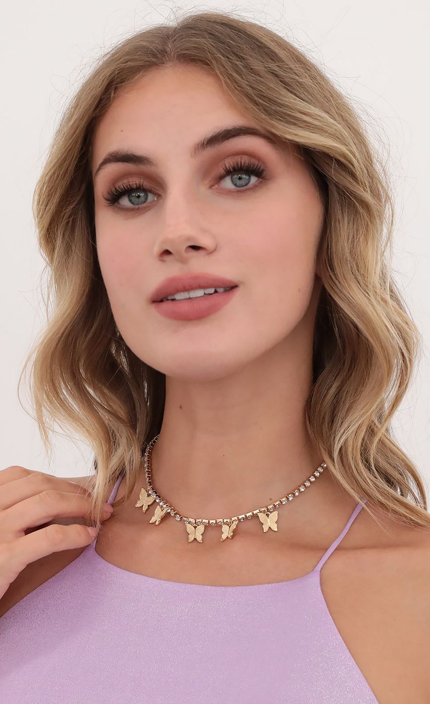 Picture Mini Gold Butterfly Charm Necklace. Source: https://media-img.lucyinthesky.com/data/Jul20_1/850xAUTO/781A4908.JPG