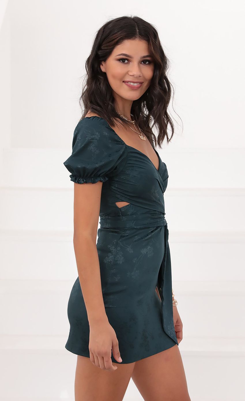 Picture Puff Sleeve Wrap Dress in Green Satin and Floral. Source: https://media-img.lucyinthesky.com/data/Jul20_2/850xAUTO/781A1327.JPG