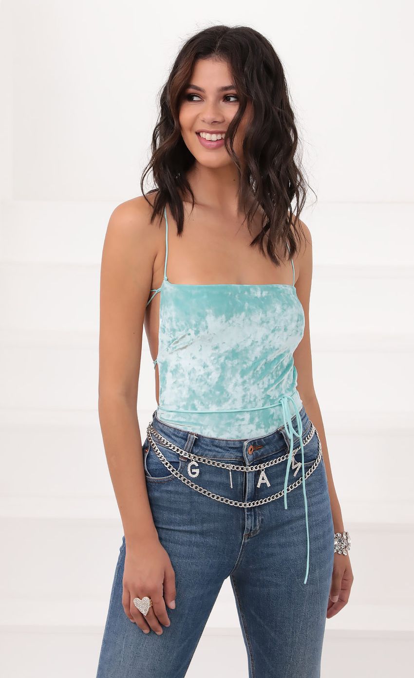Picture Strappy Back Bodysuit in Aqua Velvet. Source: https://media-img.lucyinthesky.com/data/Jul20_2/850xAUTO/781A49421.JPG