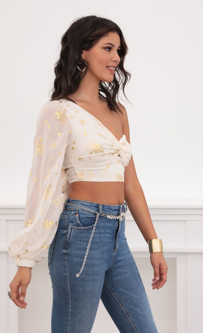 Picture Jasmine Puff Sleeve Chiffon Top in White and Gold. Source: https://media-img.lucyinthesky.com/data/Jul20_2/850xAUTO/781A7488.JPG