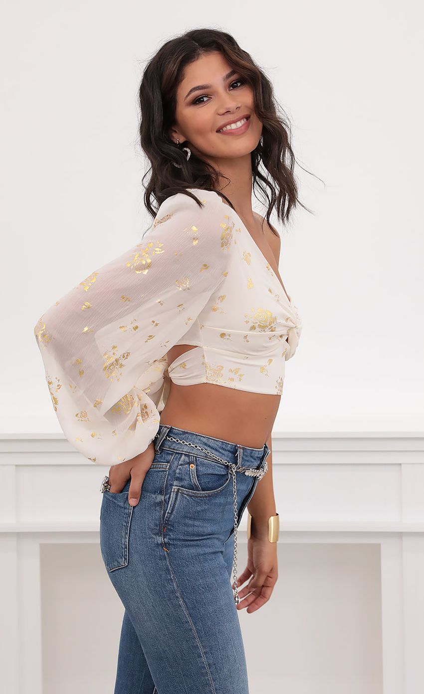 Picture Jasmine Puff Sleeve Chiffon Top in White and Gold. Source: https://media-img.lucyinthesky.com/data/Jul20_2/850xAUTO/781A7509.JPG