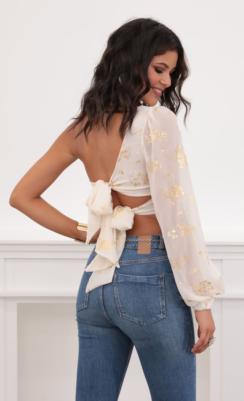 Picture Jasmine Puff Sleeve Chiffon Top in White and Gold. Source: https://media-img.lucyinthesky.com/data/Jul20_2/850xAUTO/781A7538.JPG