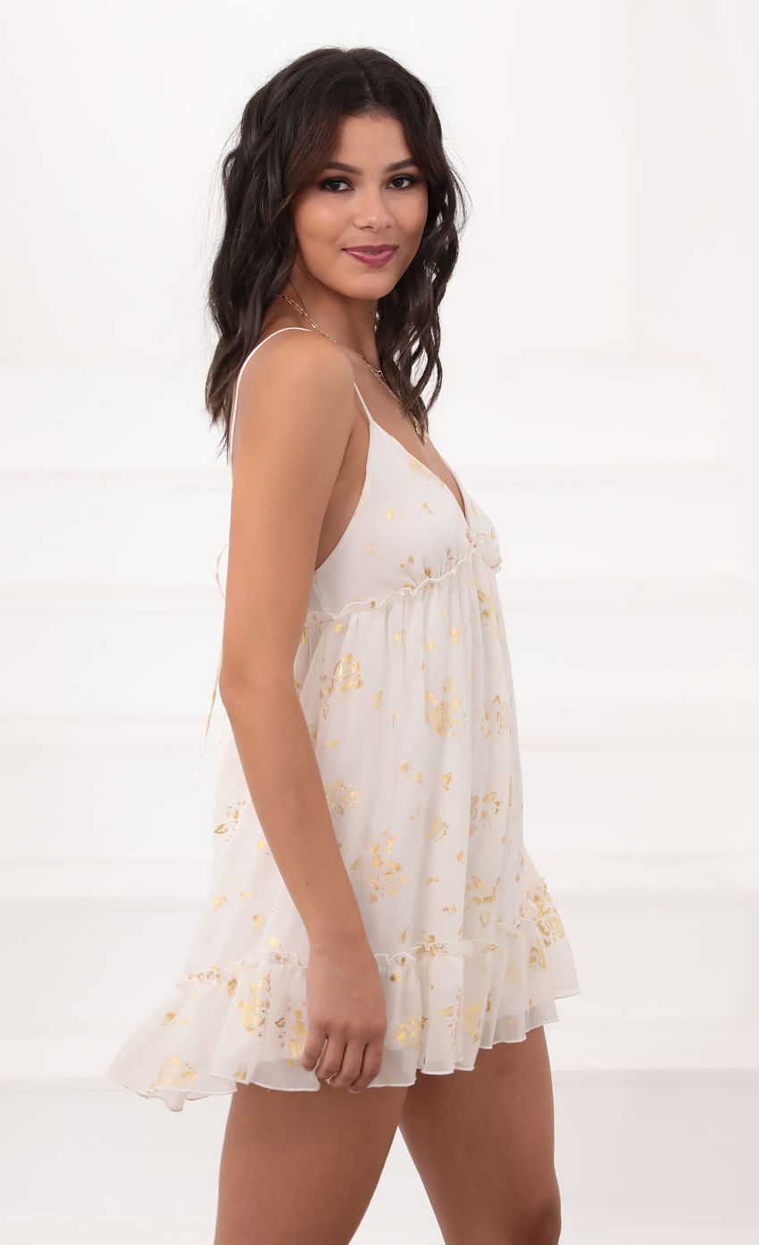 Picture Day Dress in Ivory and Gold Detailing. Source: https://media-img.lucyinthesky.com/data/Jul20_2/850xAUTO/781A9172.JPG
