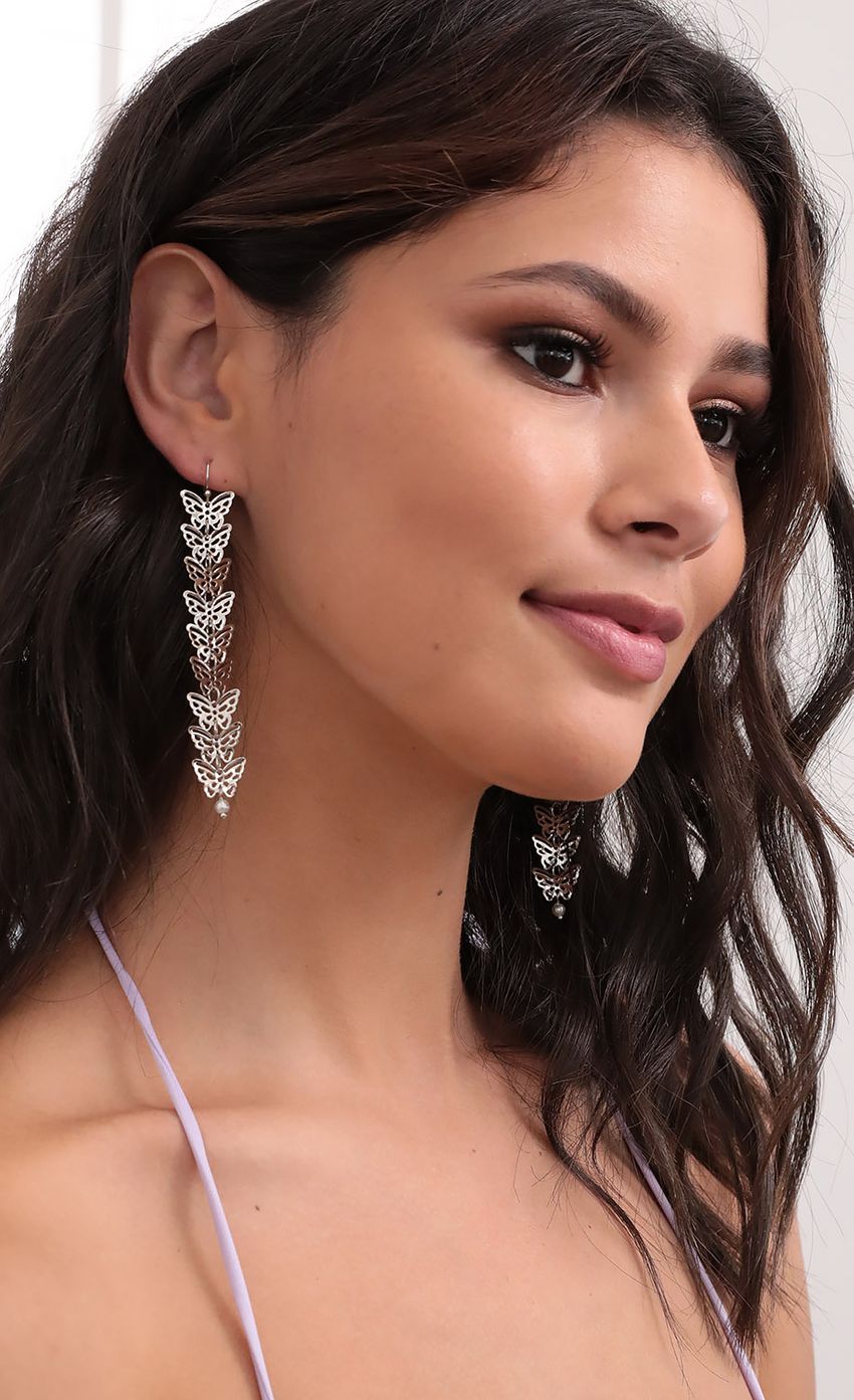 Picture Dangling Butterfly Earrings. Source: https://media-img.lucyinthesky.com/data/Jul20_2/850xAUTO/781A9951.JPG