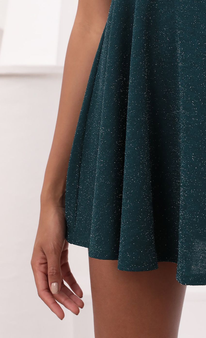 Picture One Shoulder Dress in Turquoise Sparkle. Source: https://media-img.lucyinthesky.com/data/Jul21_1/850xAUTO/1V9A3588.JPG