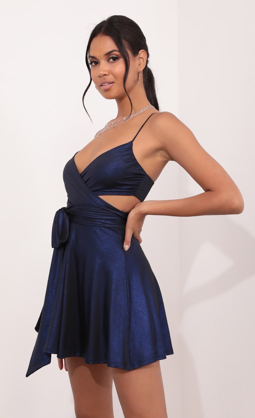 Picture Wrap Dress in Black and Blue Sparkle. Source: https://media-img.lucyinthesky.com/data/Jul21_1/850xAUTO/1V9A3752.JPG