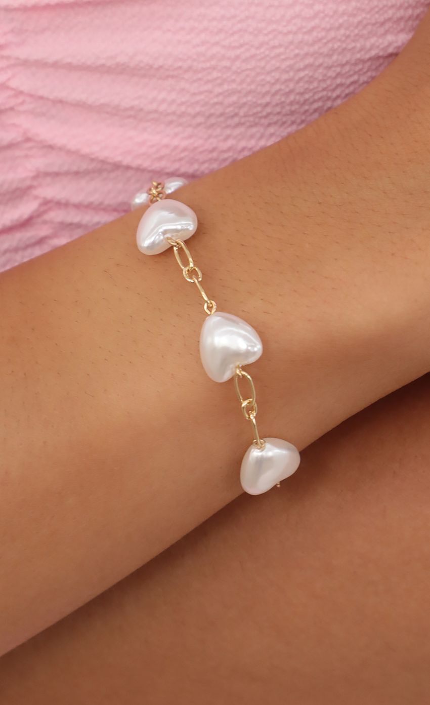 Picture All The Pearl Love Bracelet in Gold. Source: https://media-img.lucyinthesky.com/data/Jul21_1/850xAUTO/AT2A0544.JPG