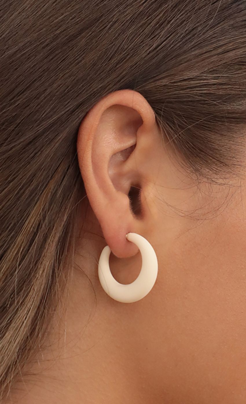 Picture Puff Princess Open Hoop Earring in White. Source: https://media-img.lucyinthesky.com/data/Jul21_1/850xAUTO/AT2A0721.JPG