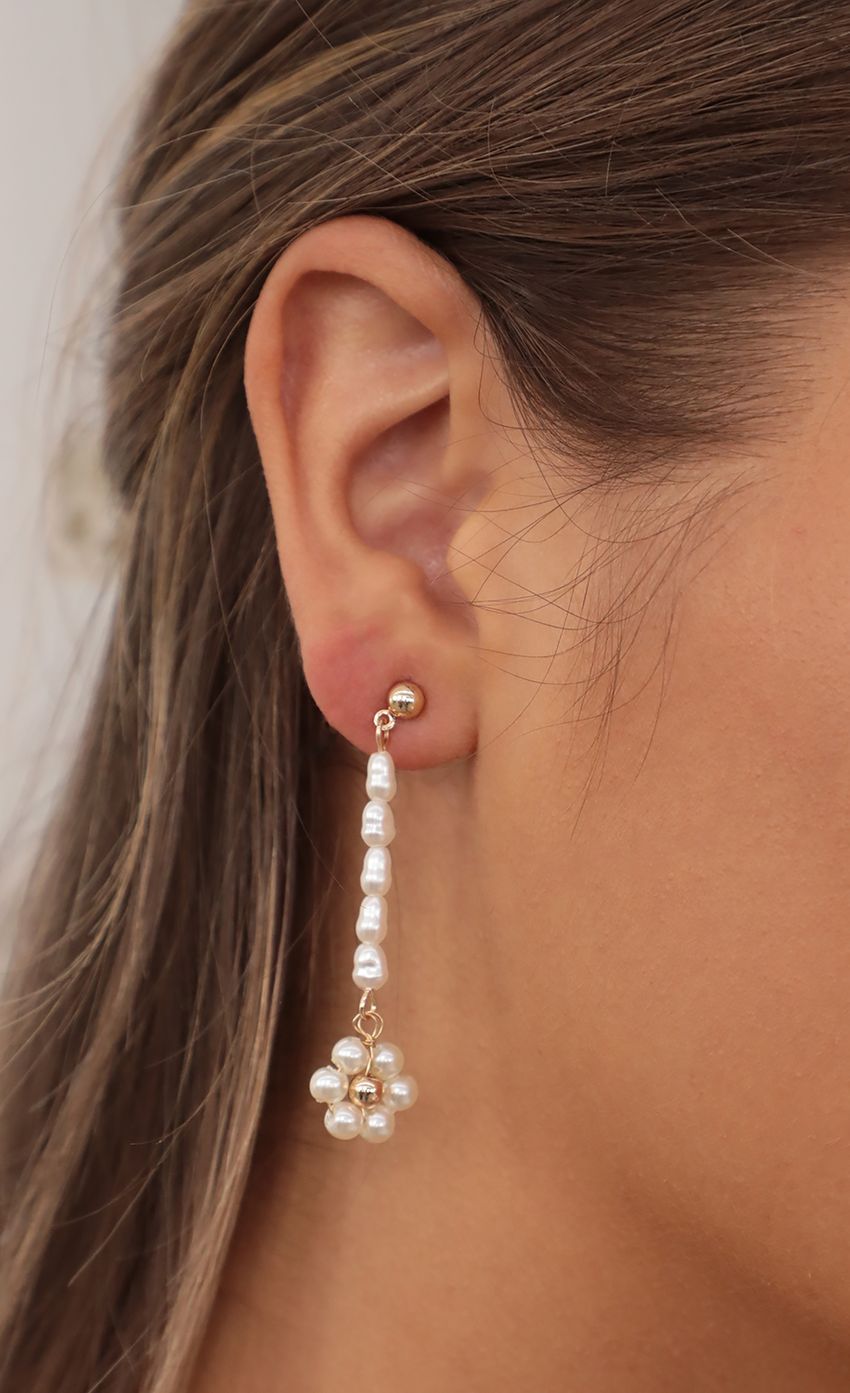 Picture Pearl Flower Fields Earrings in Gold. Source: https://media-img.lucyinthesky.com/data/Jul21_1/850xAUTO/AT2A1235_COPY.JPG