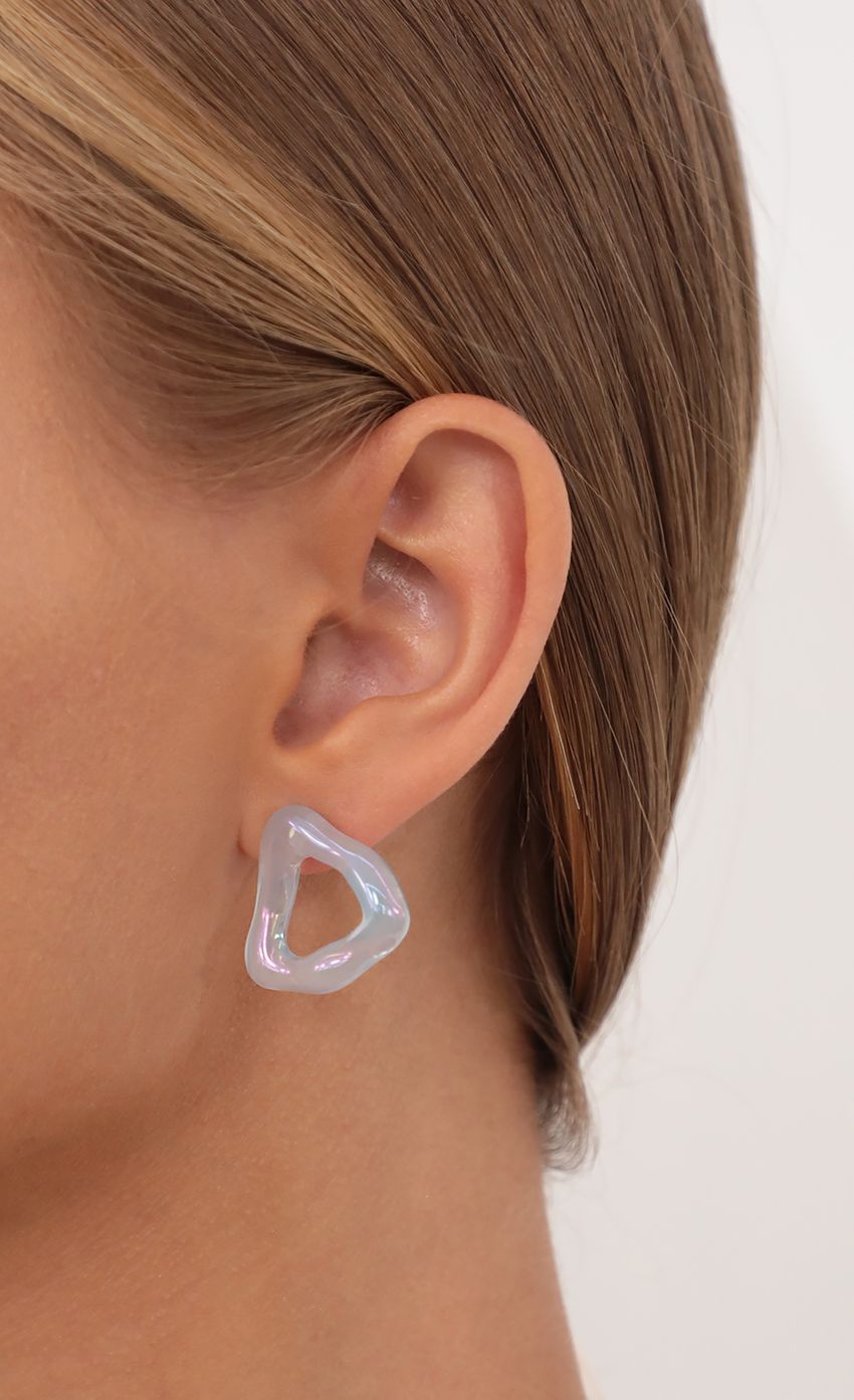 Picture Wavy Iridescent Triangle Earrings in Blue. Source: https://media-img.lucyinthesky.com/data/Jul21_1/850xAUTO/AT2A7189.JPG