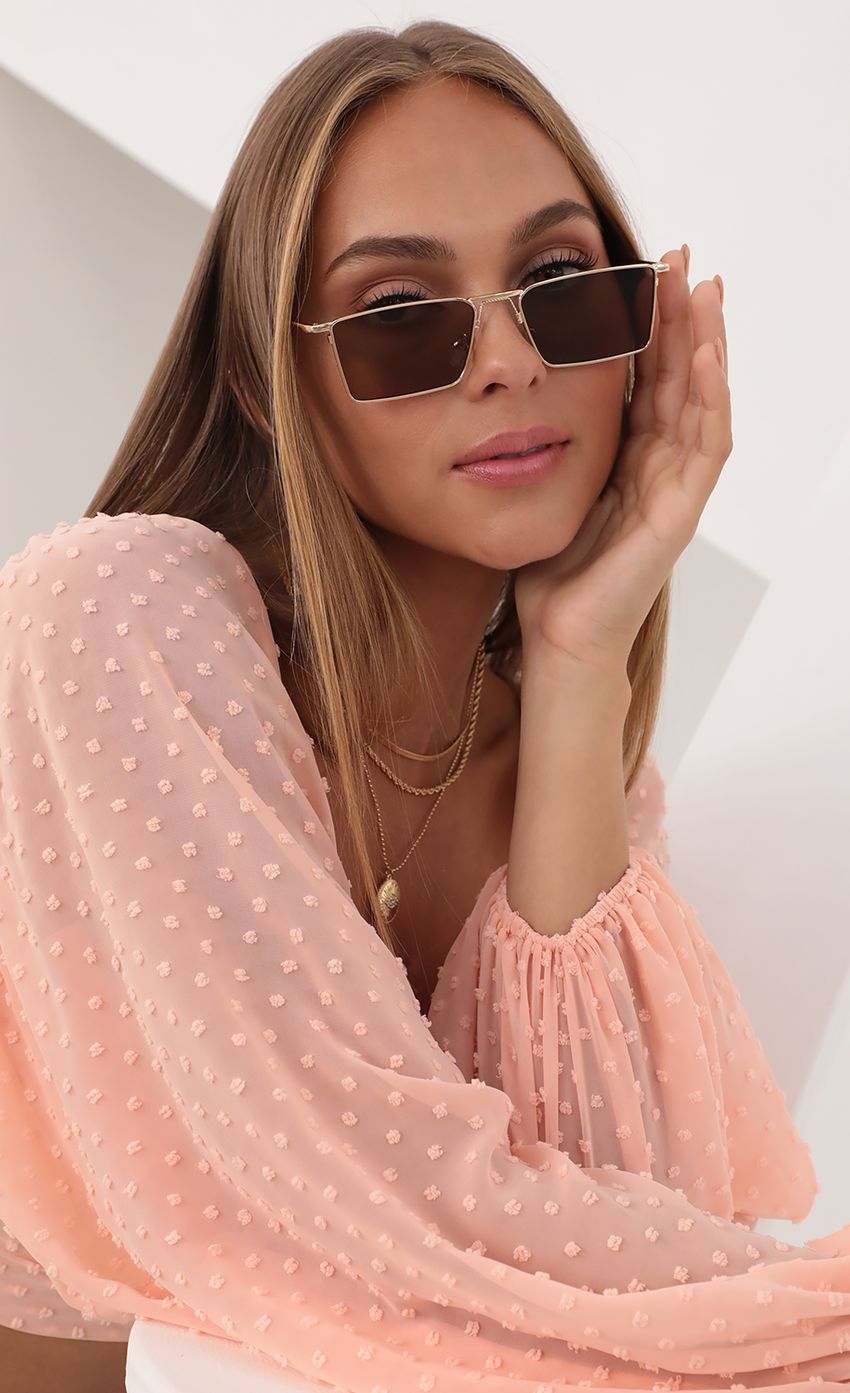 Picture Donna Dee Vintage Rectangle Sunglasses in Brown/Gold. Source: https://media-img.lucyinthesky.com/data/Jul21_1/850xAUTO/AT2A91992.JPG