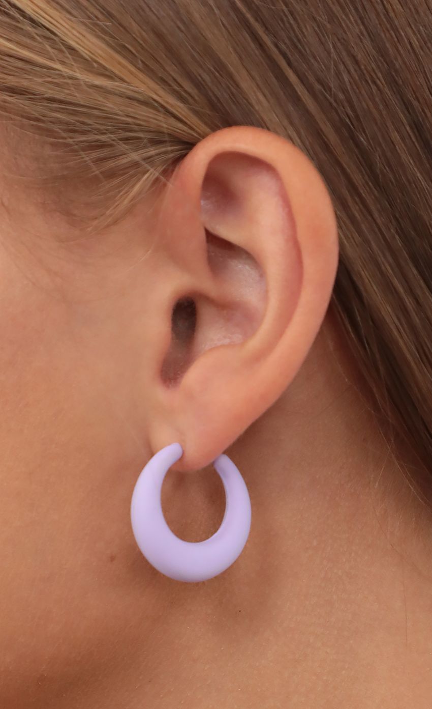 Picture Puff Princess Open Hoop Earring in Lavender. Source: https://media-img.lucyinthesky.com/data/Jul21_2/850xAUTO/AT2A0502.JPG
