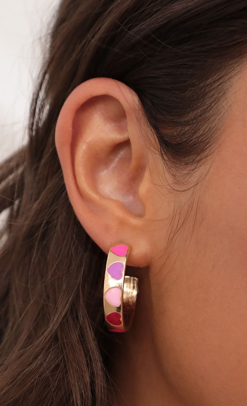 Picture Miss Valentine Flat Hoop Earrings in Gold. Source: https://media-img.lucyinthesky.com/data/Jul21_2/850xAUTO/AT2A8695.JPG