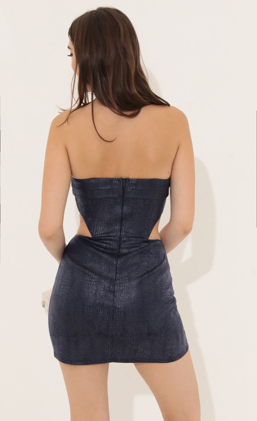Picture Snake Print Corset Cutout Dress in Navy. Source: https://media-img.lucyinthesky.com/data/Jul22/850xAUTO/1a1db280-0e46-4f66-9fed-d5aa727ebef1.jpg