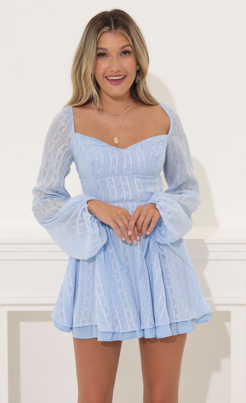 Picture Deborah Dotted Chiffon Fit and Flare Dress in Blue. Source: https://media-img.lucyinthesky.com/data/Jul22/850xAUTO/47cba229-7e04-4150-a378-7832994298e7.jpg