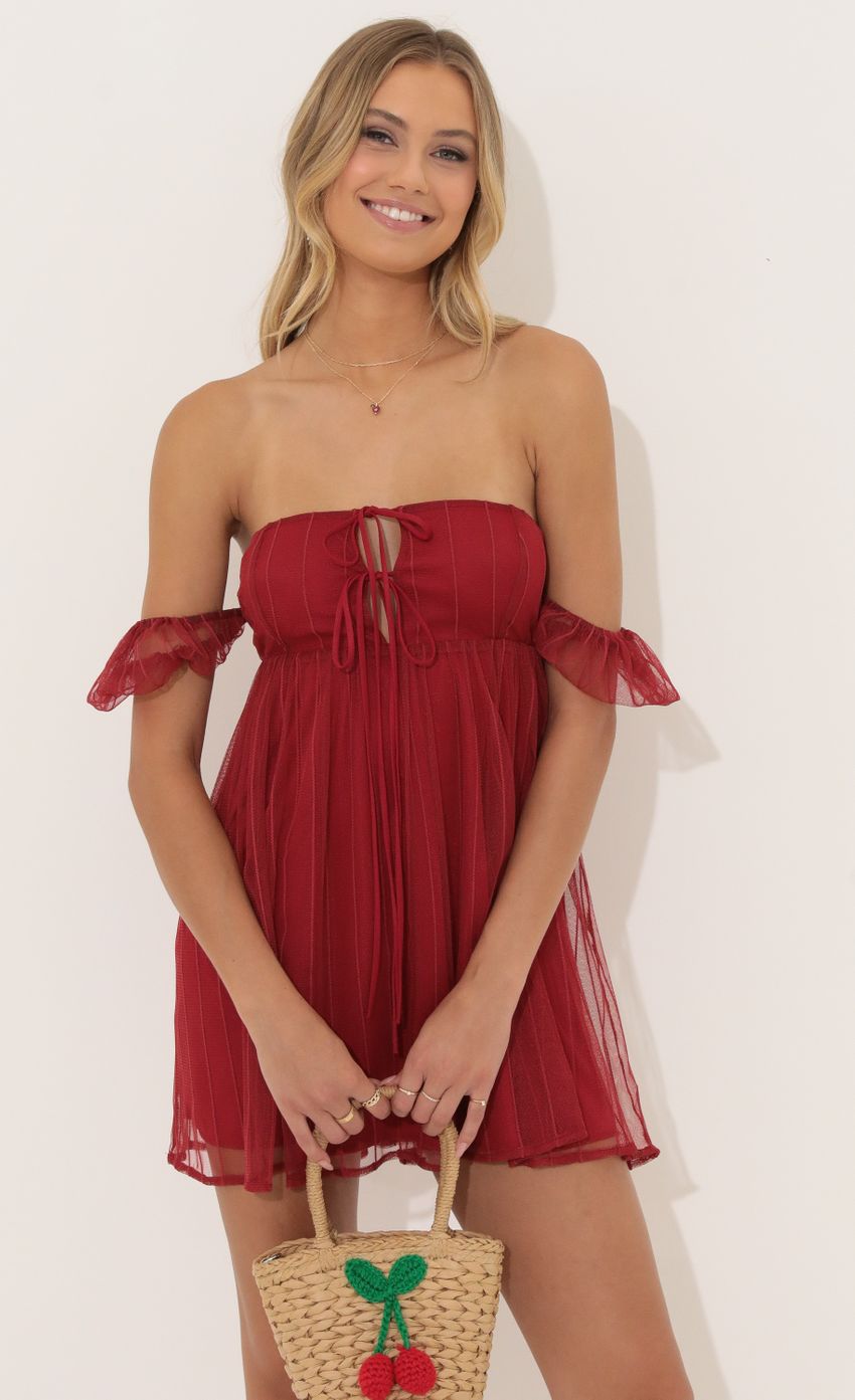 Picture Striped Tulle Baby Doll Dress in Red. Source: https://media-img.lucyinthesky.com/data/Jul22/850xAUTO/c70067d3-d31d-4af9-9ceb-d7440f2494e4.jpg