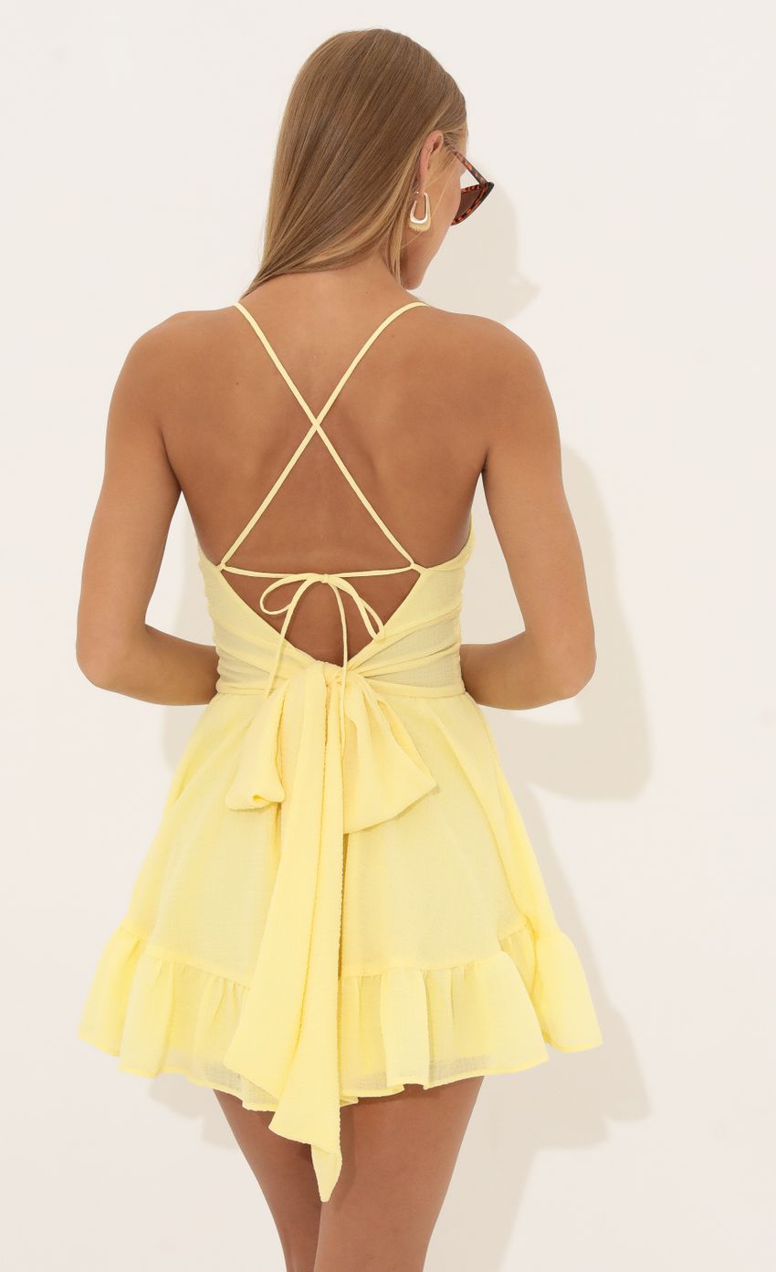 Picture Crepe Flare Dress in Yellow. Source: https://media-img.lucyinthesky.com/data/Jul22/850xAUTO/d24bfd83-0261-4412-8e99-7d04131708fa.jpg