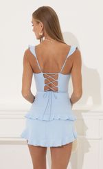 Picture Techno Crepe Ruffle Corset Dress in Blue. Source: https://media-img.lucyinthesky.com/data/Jul22_1/150xAUTO/1V9A5132.JPG