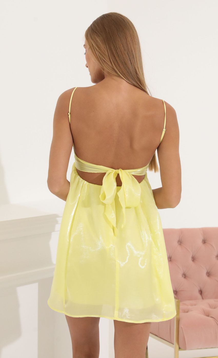 Picture Juno Shiny Organza Baby Doll Dress in Yellow. Source: https://media-img.lucyinthesky.com/data/Jul22_1/850xAUTO/1V9A7525.JPG
