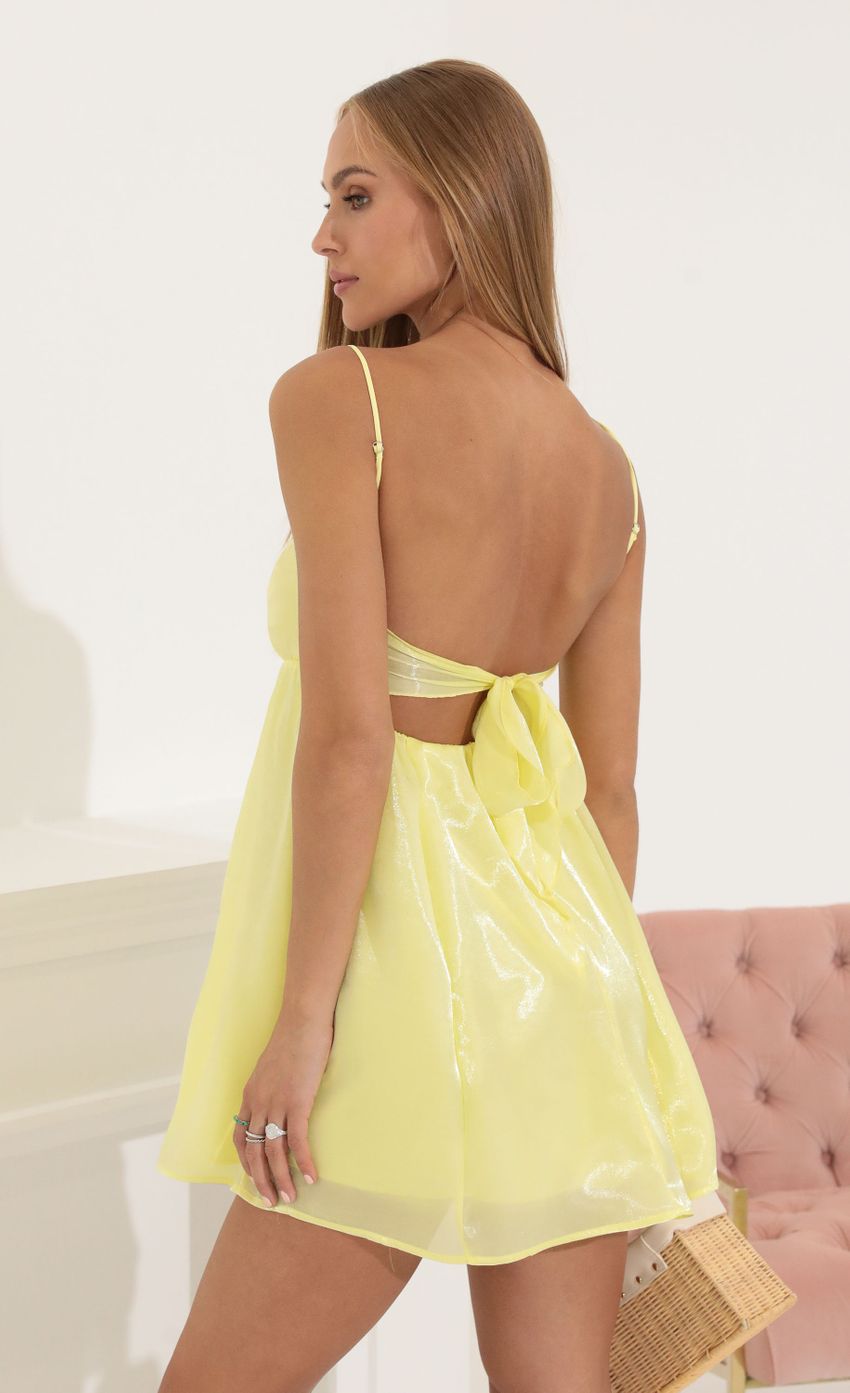 Picture Juno Shiny Organza Baby Doll Dress in Yellow. Source: https://media-img.lucyinthesky.com/data/Jul22_1/850xAUTO/1V9A7531.JPG