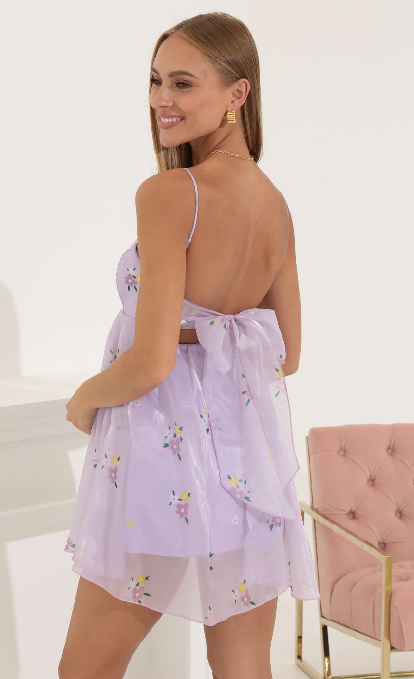 Picture Floral Shiny Organza Baby Doll Dress in Purple. Source: https://media-img.lucyinthesky.com/data/Jul22_1/850xAUTO/1V9A8264.JPG