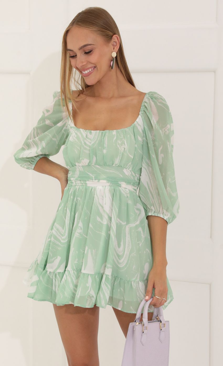 Picture Ruffle Marble Chiffon Dress in Green. Source: https://media-img.lucyinthesky.com/data/Jul22_1/850xAUTO/1V9A8361.JPG
