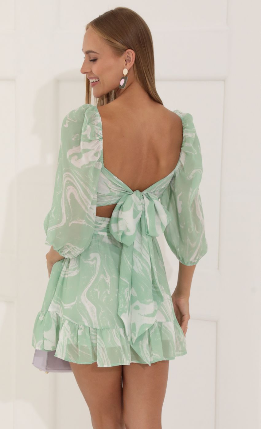 Picture Ruffle Marble Chiffon Dress in Green. Source: https://media-img.lucyinthesky.com/data/Jul22_1/850xAUTO/1V9A8471.JPG